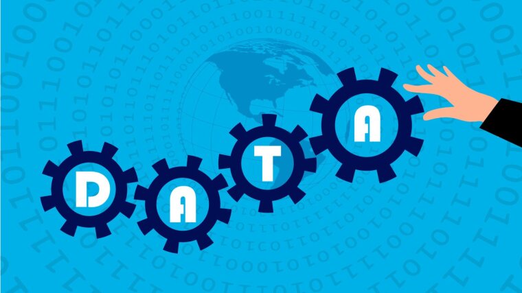 Das Wort "Data" in miteinander verbundenen Zahnrädern.